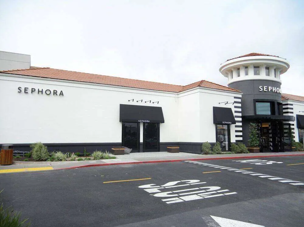 Exterior view of Sephora store in Corte Madera with white stucco and black accents.