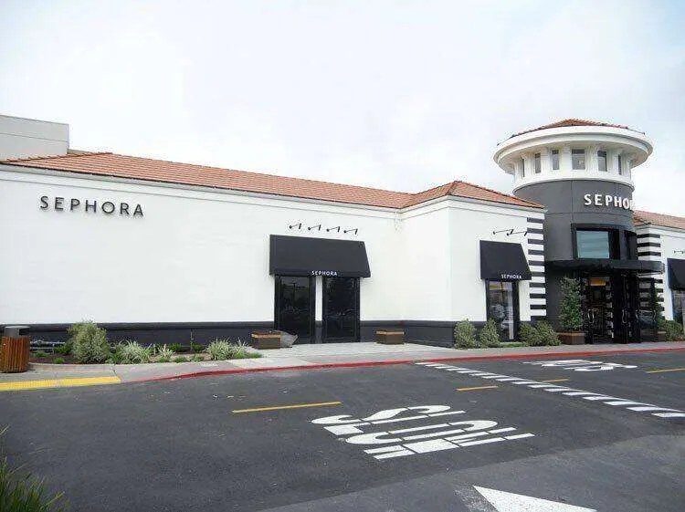 Exterior view of Sephora store in Corte Madera with white stucco and black accents.